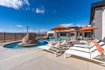 Pool with chairs and umbrellas